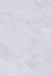 Close-up of the veining in this white marble coffee table