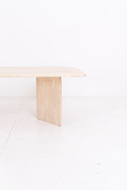 Minimalist travertine coffee close up table on a white background