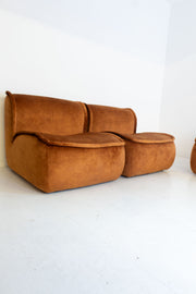 Modular vintage brown sofa on a white background