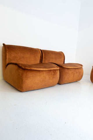 Modular vintage brown sofa on a white background