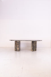Green and oat coloured vintage marble table on a white background