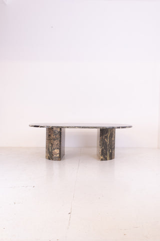 Green and oat coloured vintage marble table on a white background