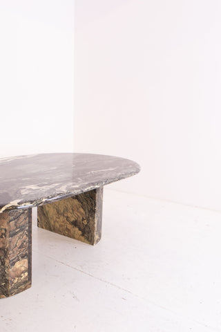 Marble coffee table with a unique design on a white background