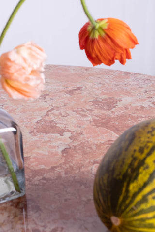 close up of orange marble table 