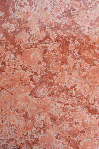 Close up detail of orange marble grain 
