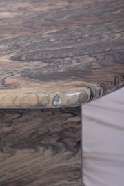 Detailed shot showing a small chip in the marble edge