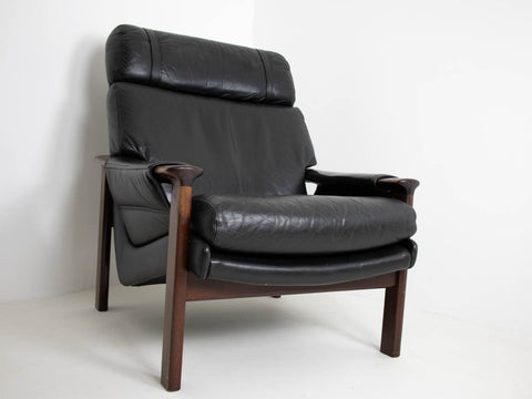 Leather armchair with footstool