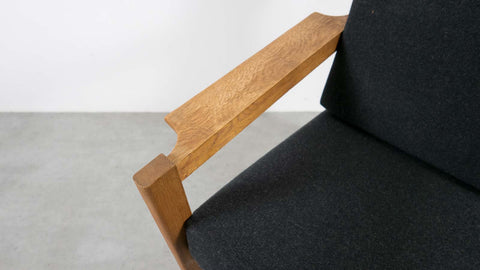 Oak armchair with wide armrests