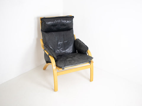 Danish Modern armchair with footstool