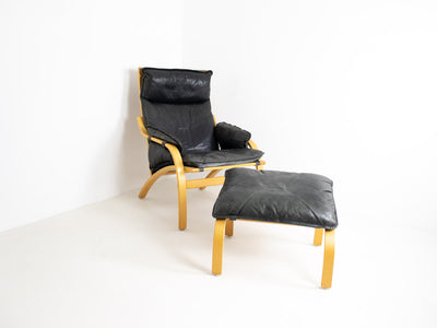 Danish armchair with footstool