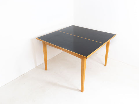 Extendable mid century modern dining table
