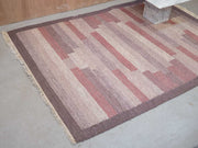 pink, grey, purple rug
