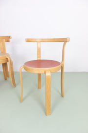 Wooden chair with coloured seat