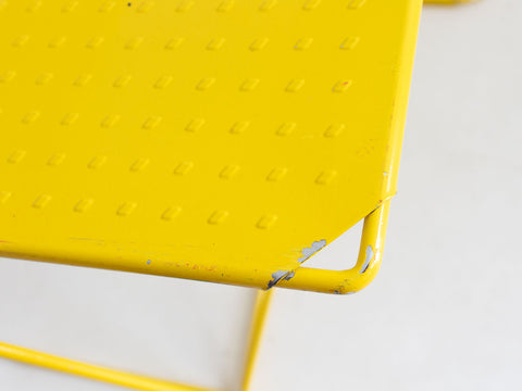 Yellow and blue stacking chairs